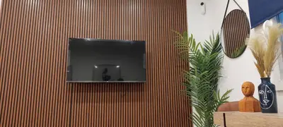 Una televisión o centro de entretenimiento en Apartamento en pleno centro