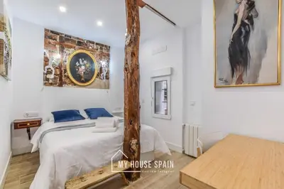 Cama o camas de una habitación en MyHouseSpain - Sensacional piso en Malasaña