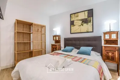 Cama o camas de una habitación en MyHouseSpain - Sensacional piso en Malasaña