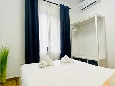 Cama o camas de una habitación en Style & Design Flat in the Center of Madrid