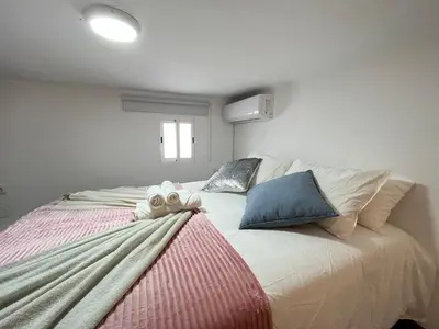 Cama o camas de una habitación en Encantador Madrid Val Izq Temporal