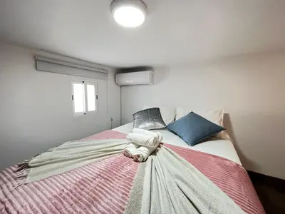 Cama o camas de una habitación en Encantador Madrid Val Izq Temporal