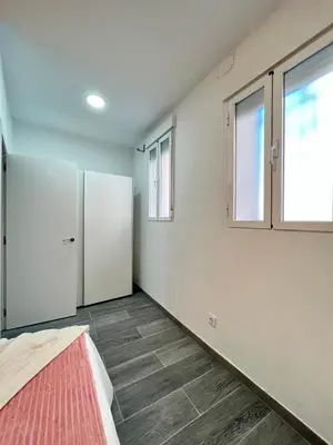 Cama o camas de una habitación en Encantador Madrid Val Izq Temporal