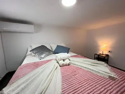 Cama o camas de una habitación en Encantador Madrid Val Izq Temporal