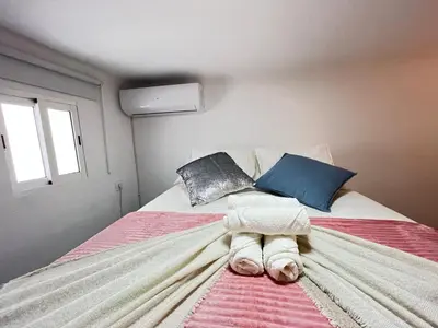 Cama o camas de una habitación en Encantador Madrid Val Izq Temporal
