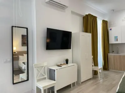 Una televisión o centro de entretenimiento en (J3) Apartamento céntrico en Madrid