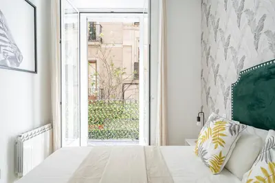 Cama o camas de una habitación en For You Rentals Elegante y bonito apartamento TEMPORAL en el Corazón de Madrid DIN131C