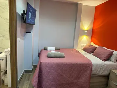 Cama o camas de una habitación en Corazón de Hortaleza 2
