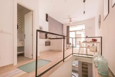 Una cocina o zona de cocina en Dúplex en Antón Martín 4 Personas