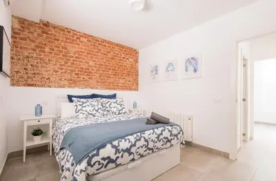 Cama o camas de una habitación en Dúplex en Antón Martín 6 Personas