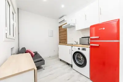 Una cocina o zona de cocina en Los Apartamentos Jacinto Benavente Centro Madrid