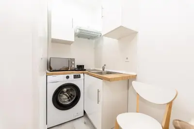 Una cocina o zona de cocina en Los Apartamentos Jacinto Benavente Centro Madrid