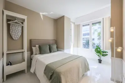 Cama o camas de una habitación en Apartamento Embajadores XIV