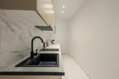 Una cocina o zona de cocina en Apartamento Embajadores XIV