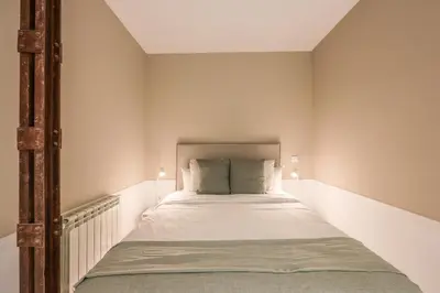 Cama o camas de una habitación en Apartamento Embajadores XIV