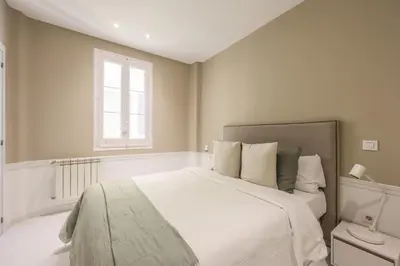Cama o camas de una habitación en Apartamento Embajadores XV