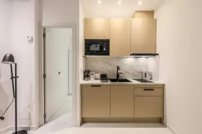 Una cocina o zona de cocina en Apartamento Embajadores XV