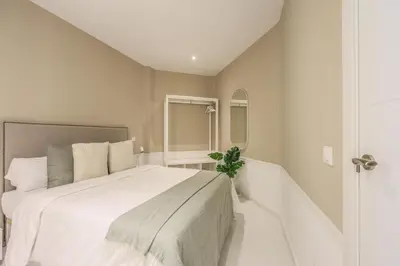 Cama o camas de una habitación en Apartamento Embajadores XV