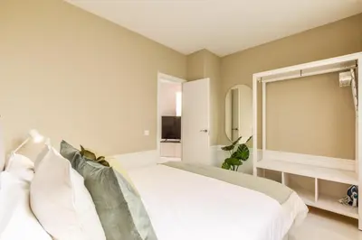 Cama o camas de una habitación en Apartamento Embajadores XVI
