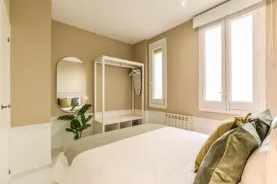 Cama o camas de una habitación en Apartamento Embajadores XVI