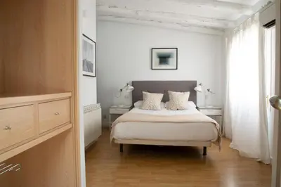 Cama o camas de una habitación en ÁTICO CENTRO HISTÓRICO MADRID