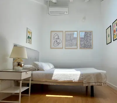 Cama o camas de una habitación en ÁTICO CENTRO HISTÓRICO MADRID