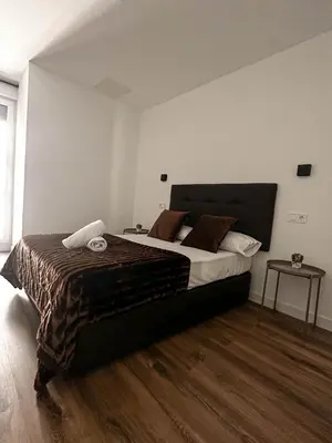 Cama o camas de una habitación en Hostal Arenal Madrid