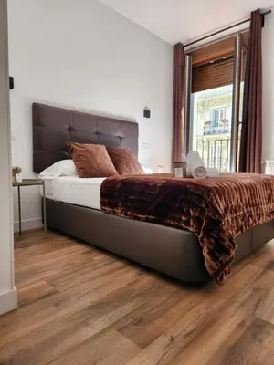 Cama o camas de una habitación en Hostal Arenal Madrid