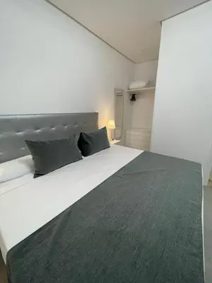 Cama o camas de una habitación en SUARA Apartamentos 1