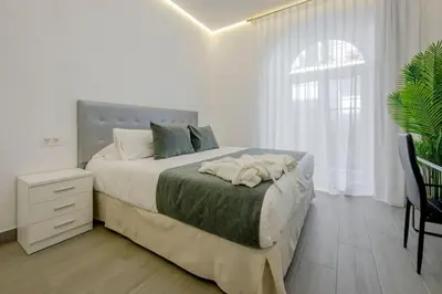 Cama o camas de una habitación en SUARA Apartamentos 1