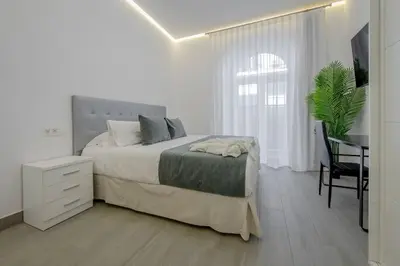 Cama o camas de una habitación en SUARA Apartamentos 2