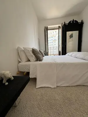 Cama o camas de una habitación en M-2 Apartamento Gran Via 2 hab