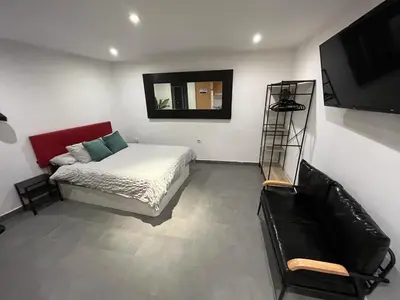 Cama o camas de una habitación en Estudio en el Corazon de Malasaña