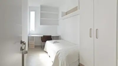 Cama o camas de una habitación en SPACE CENTER MADRID