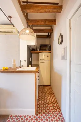 Una cocina o zona de cocina en Apartamento con terraza junto a Sol