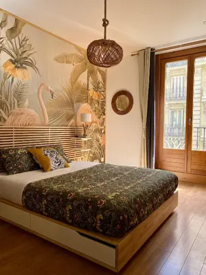 Cama o camas de una habitación en SabiaNatura - boutiqueMadrid