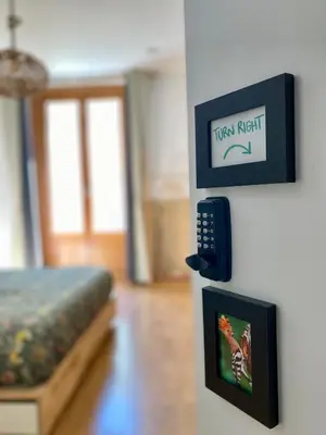 Cama o camas de una habitación en SabiaNatura - boutiqueMadrid
