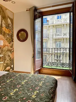 Cama o camas de una habitación en SabiaNatura - boutiqueMadrid
