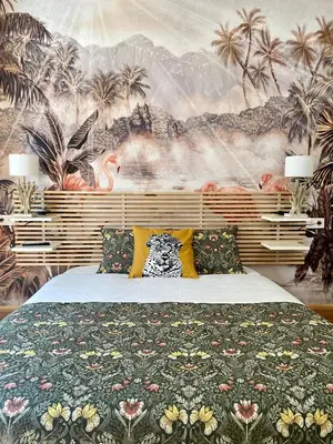 Cama o camas de una habitación en SabiaNatura - boutiqueMadrid