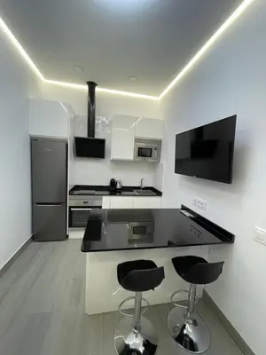 Una cocina o zona de cocina en SUARA Apartamentos 3